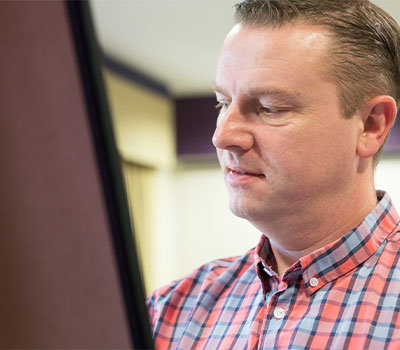 alan-writing-on-board