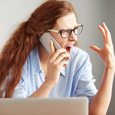 angry business woman on phone